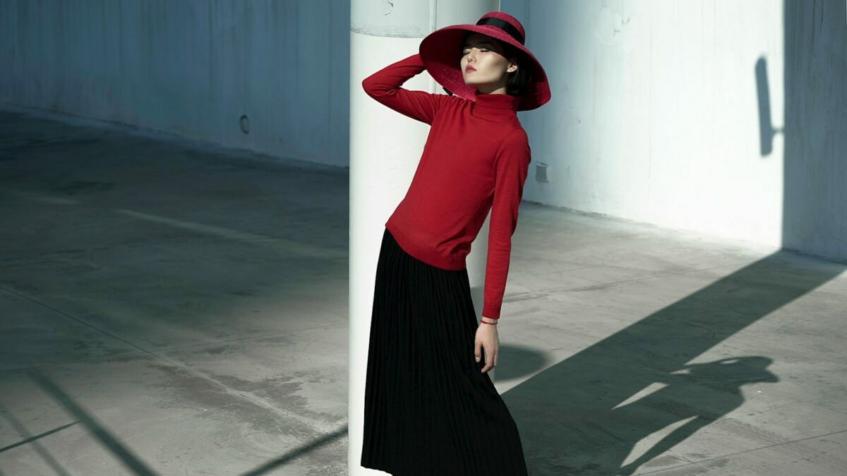 woman wearing hat and black skirt