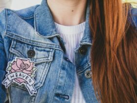 woman wearing blue denim faded jacket