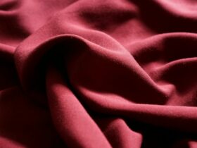 a close up view of a red fabric