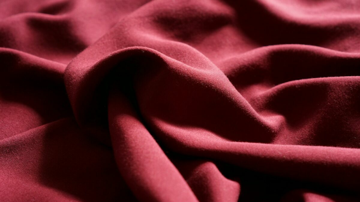 a close up view of a red fabric